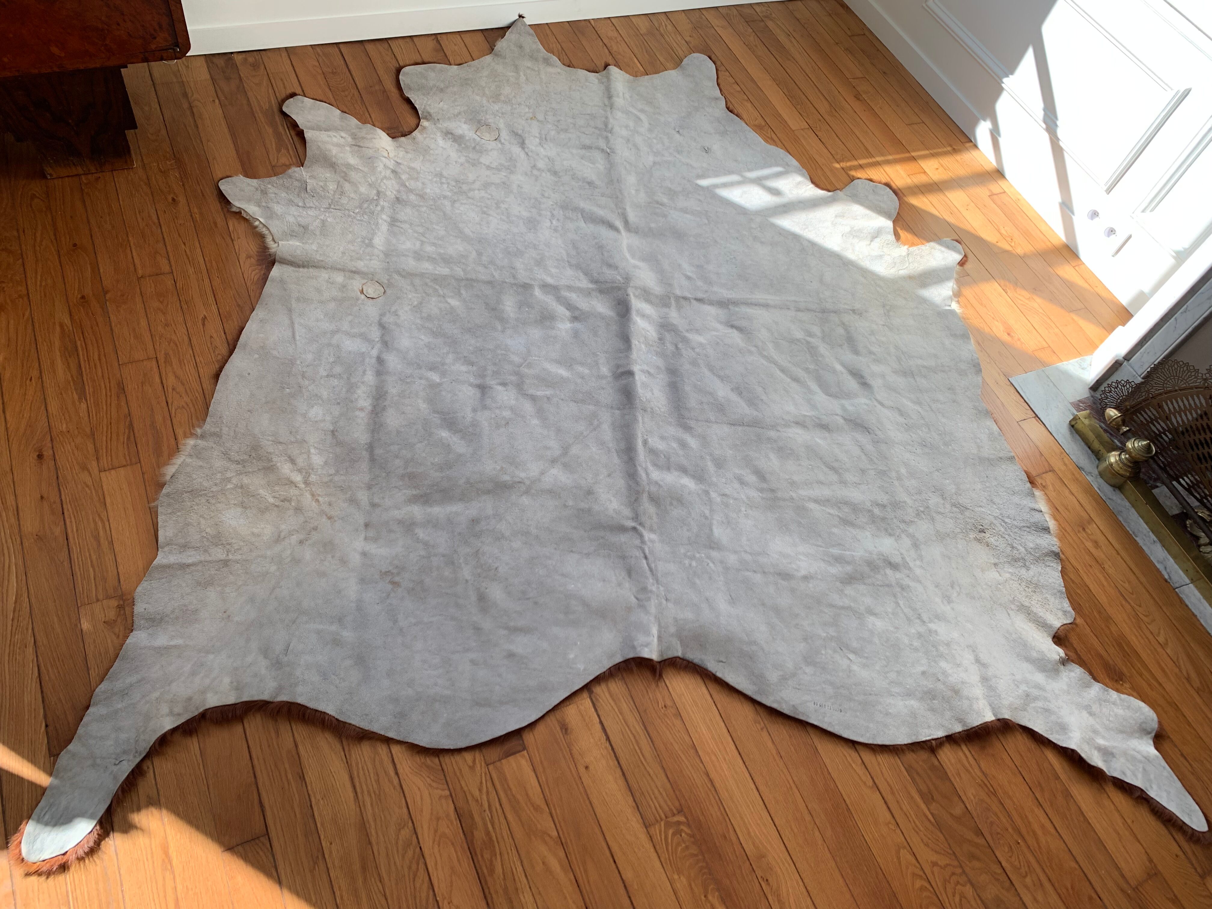 Large vintage natural cowhide carpet 195x188cm