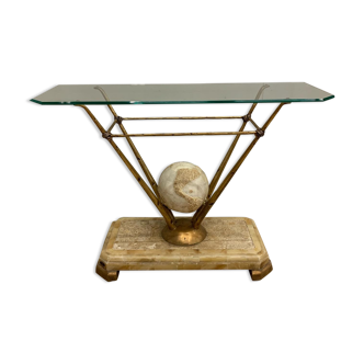 Travertine console from Fournier Paris over glass