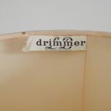 Table lamp with wooden base and fringed shade