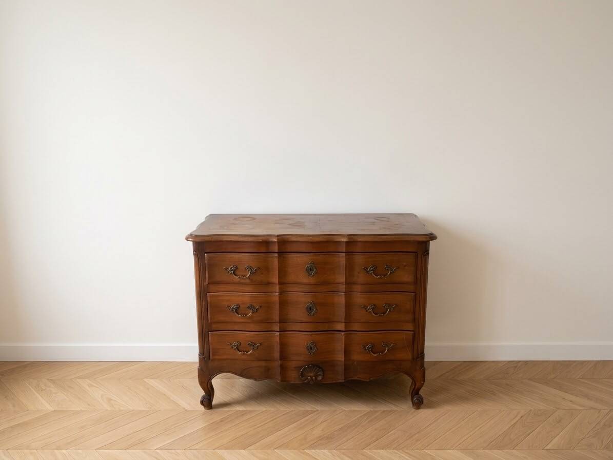 Antique curved wooden commode in classic style