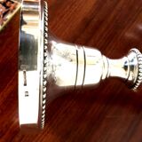 Pair of Louis XVI style silver-plated metal candelabras. Chrysalia house