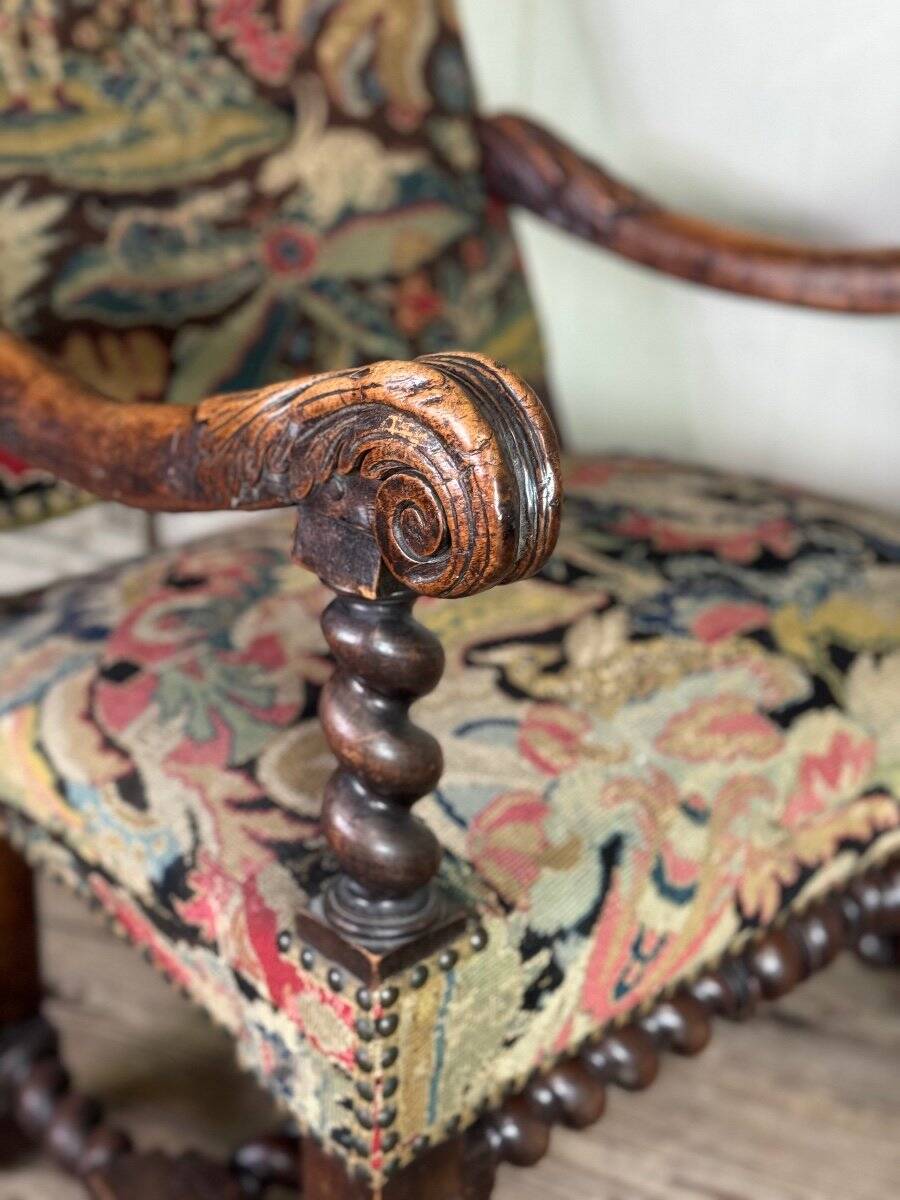 Carved walnut and tapestry armchair, late 17th century