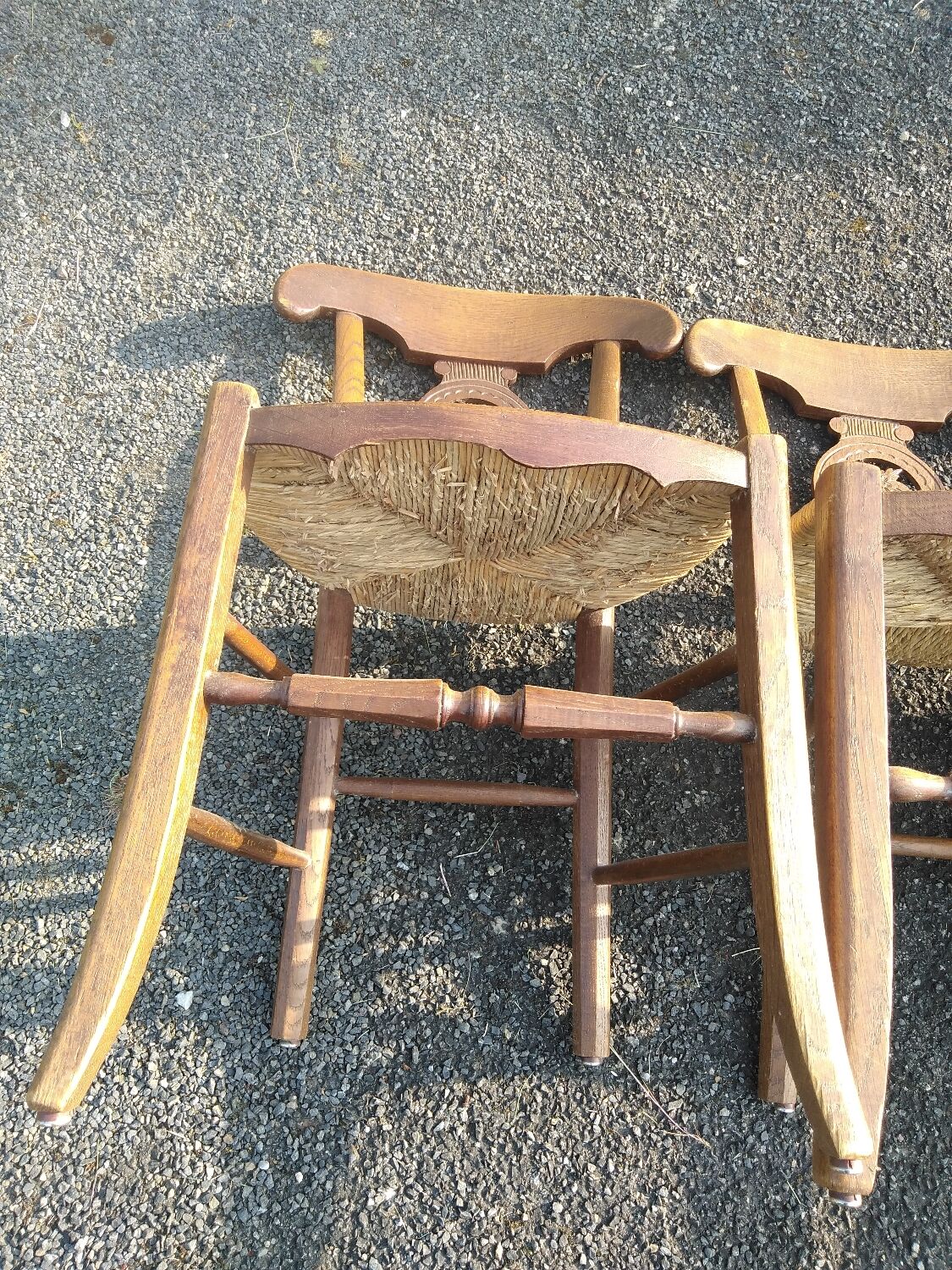 Set of four Directoire-style straw-seated chairs