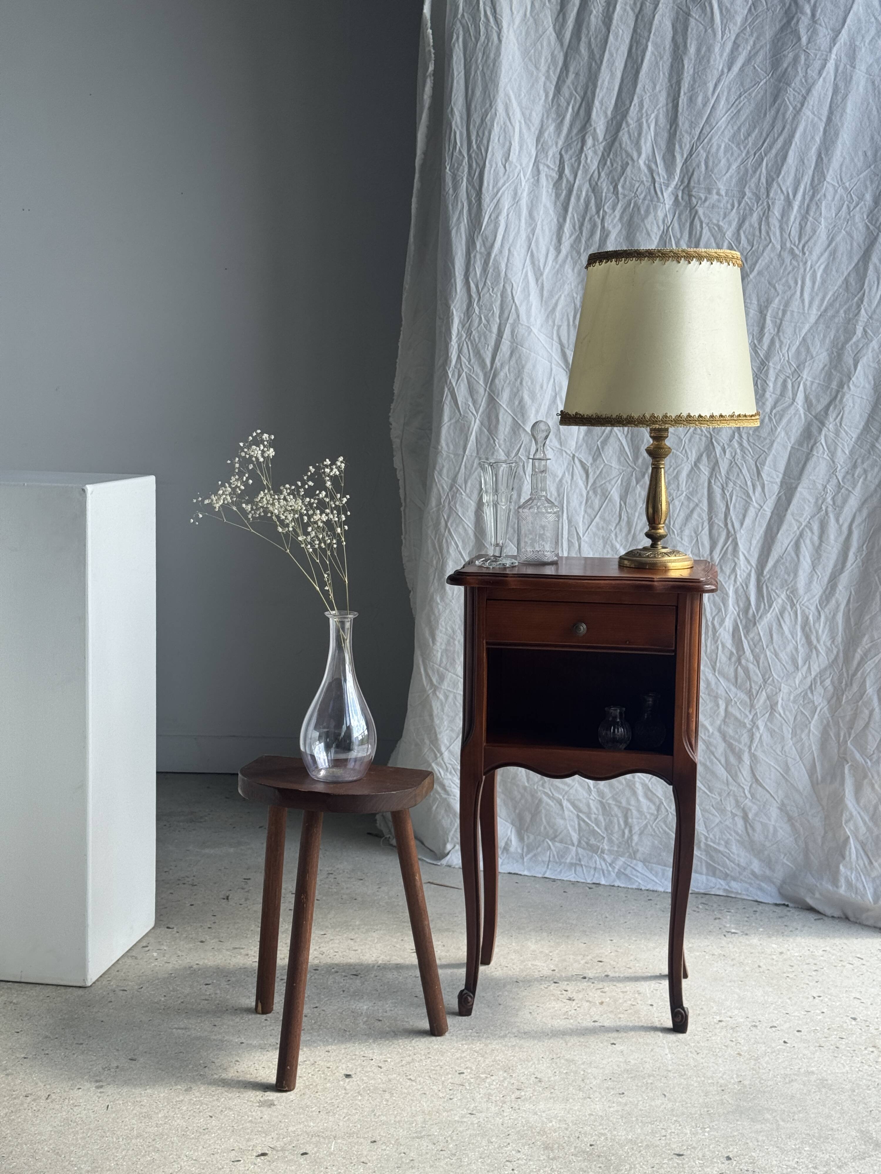 Classic wooden bedside table with drawer