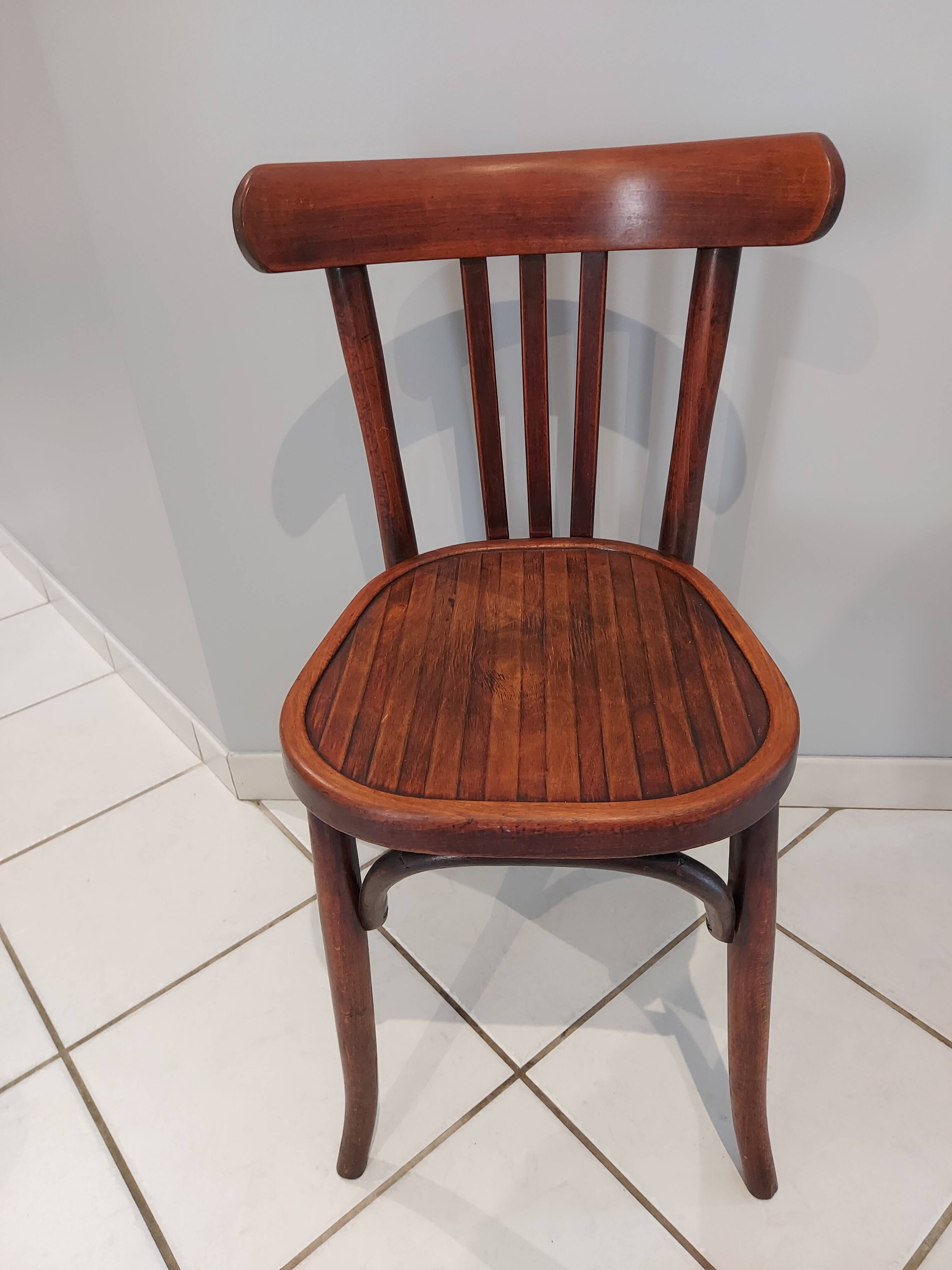 Suite of 12 chairs of bistrot Baumann 1940s