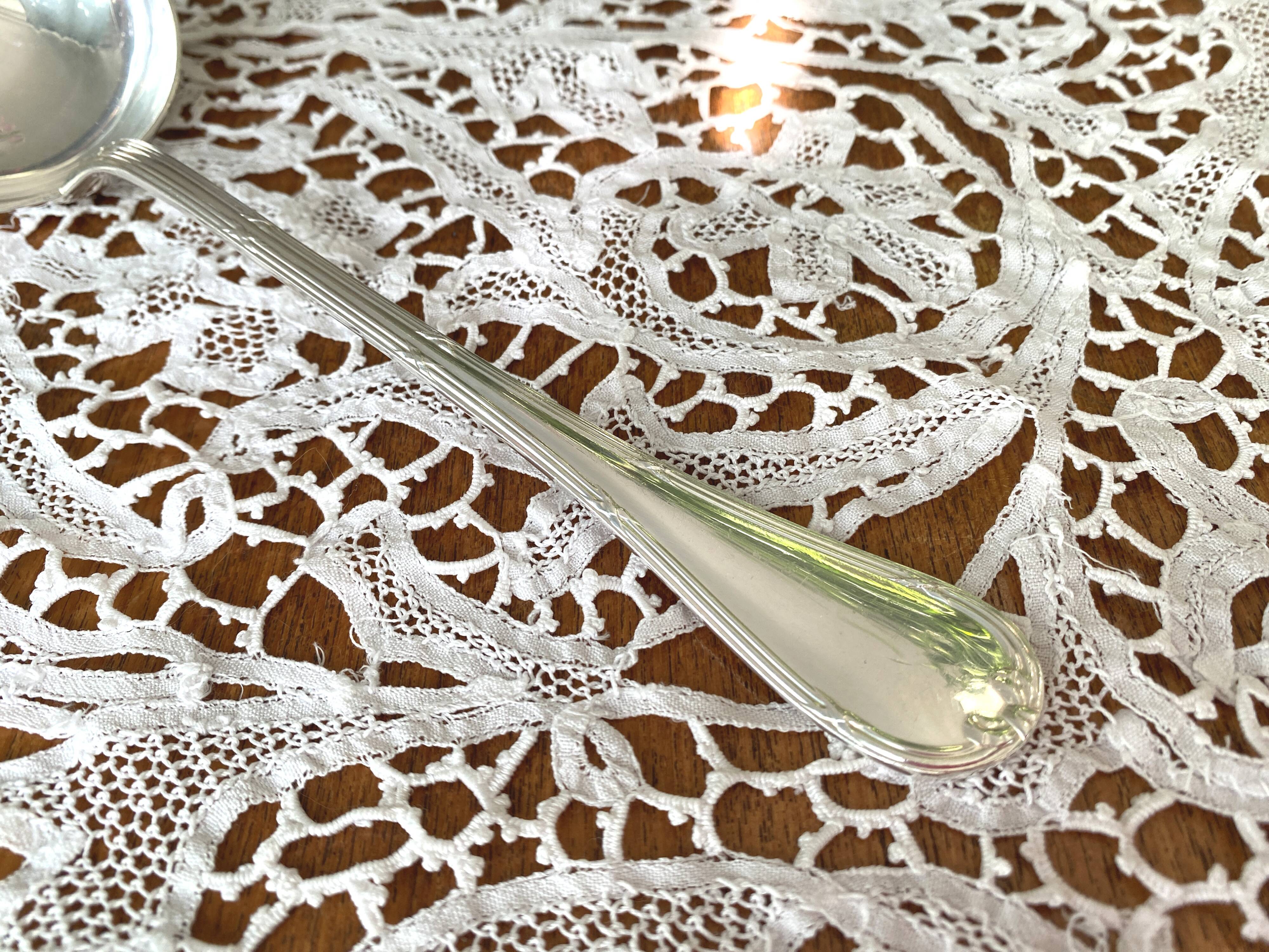 Christofle silver-plated metal ladle, Crossed Ribbon pattern, Louis XVI style