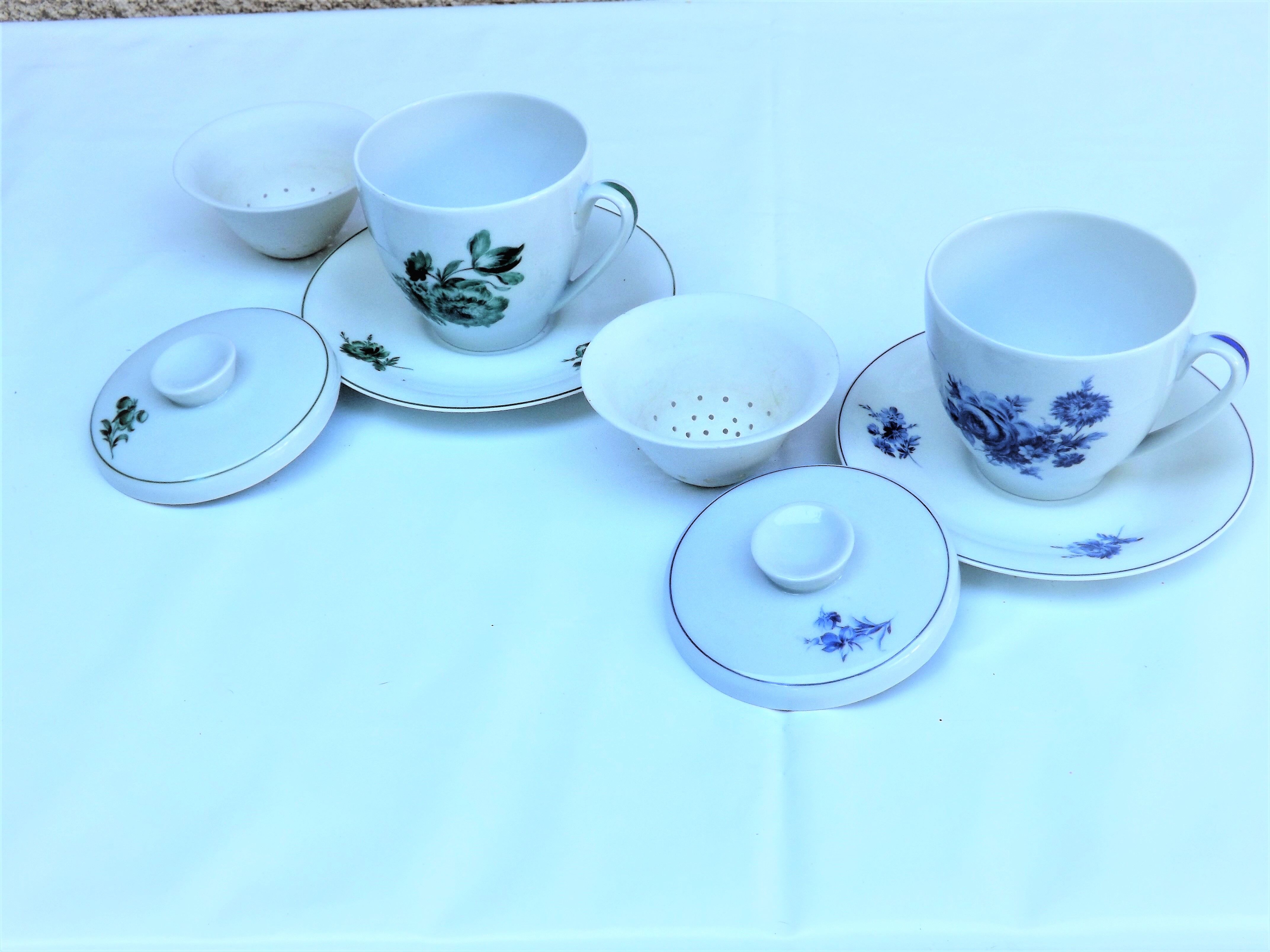 Two tea cups with lids, saucers, filters, porcelain Singer France limoges