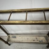 Brass and sheet metal umbrella stands from the 20th century.