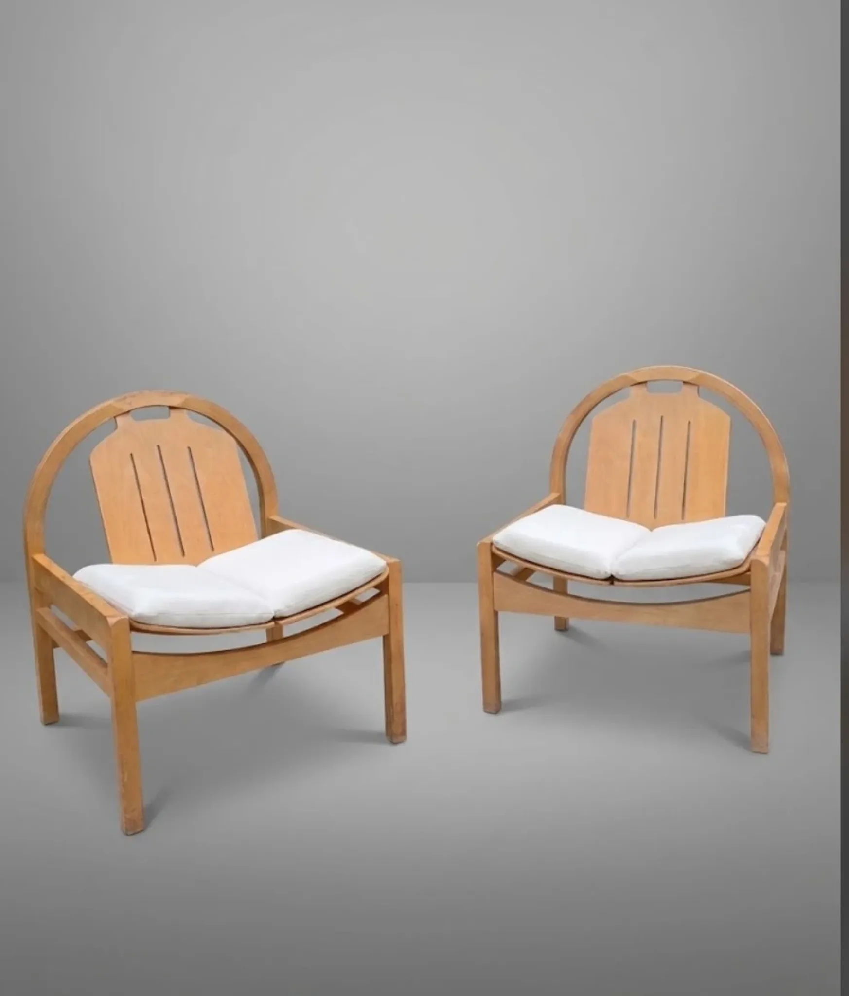 Pair of Argos lounge chairs by Baumann
