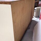 Old fridge behind wooden bar