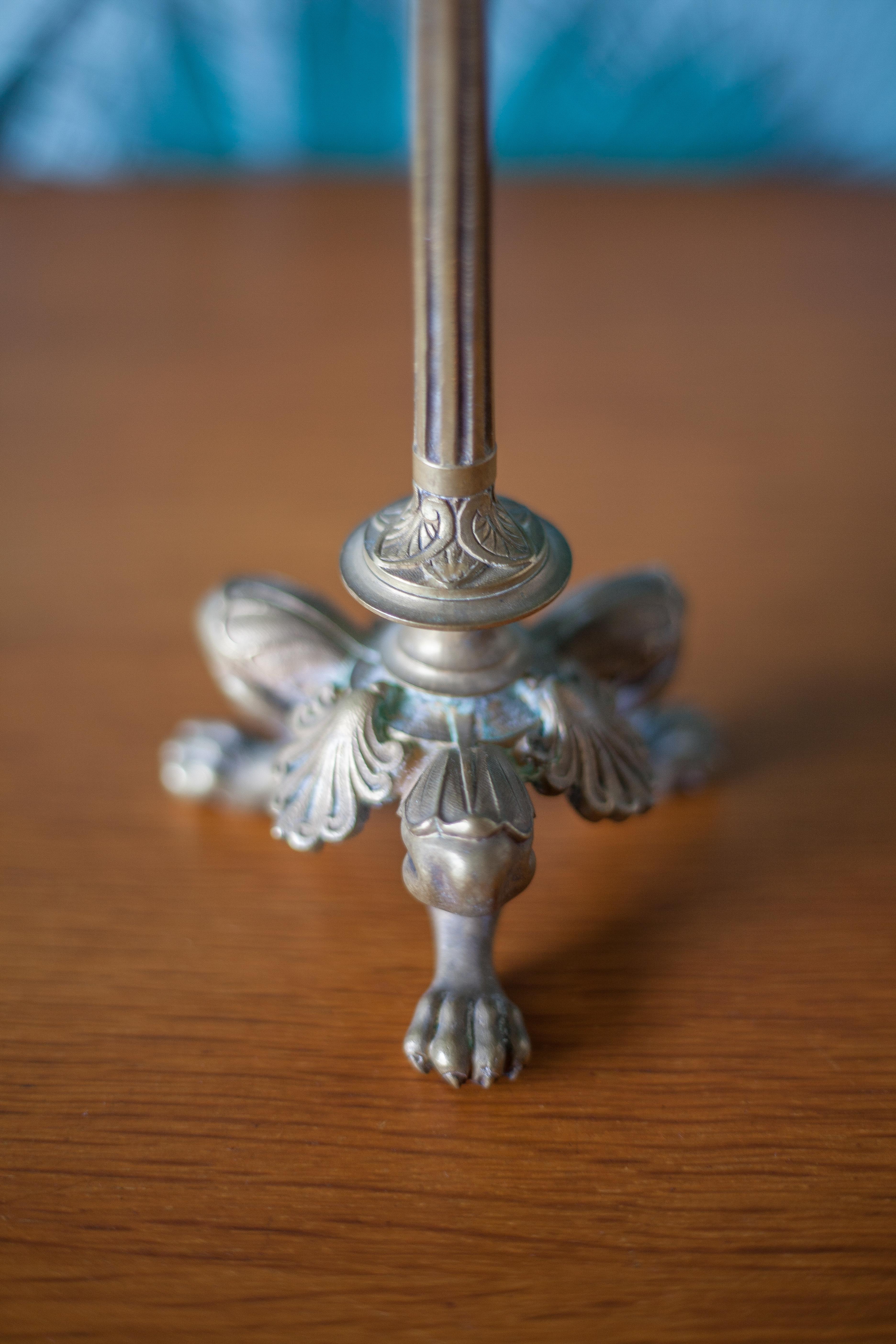 pair of numbered bronze candle holder