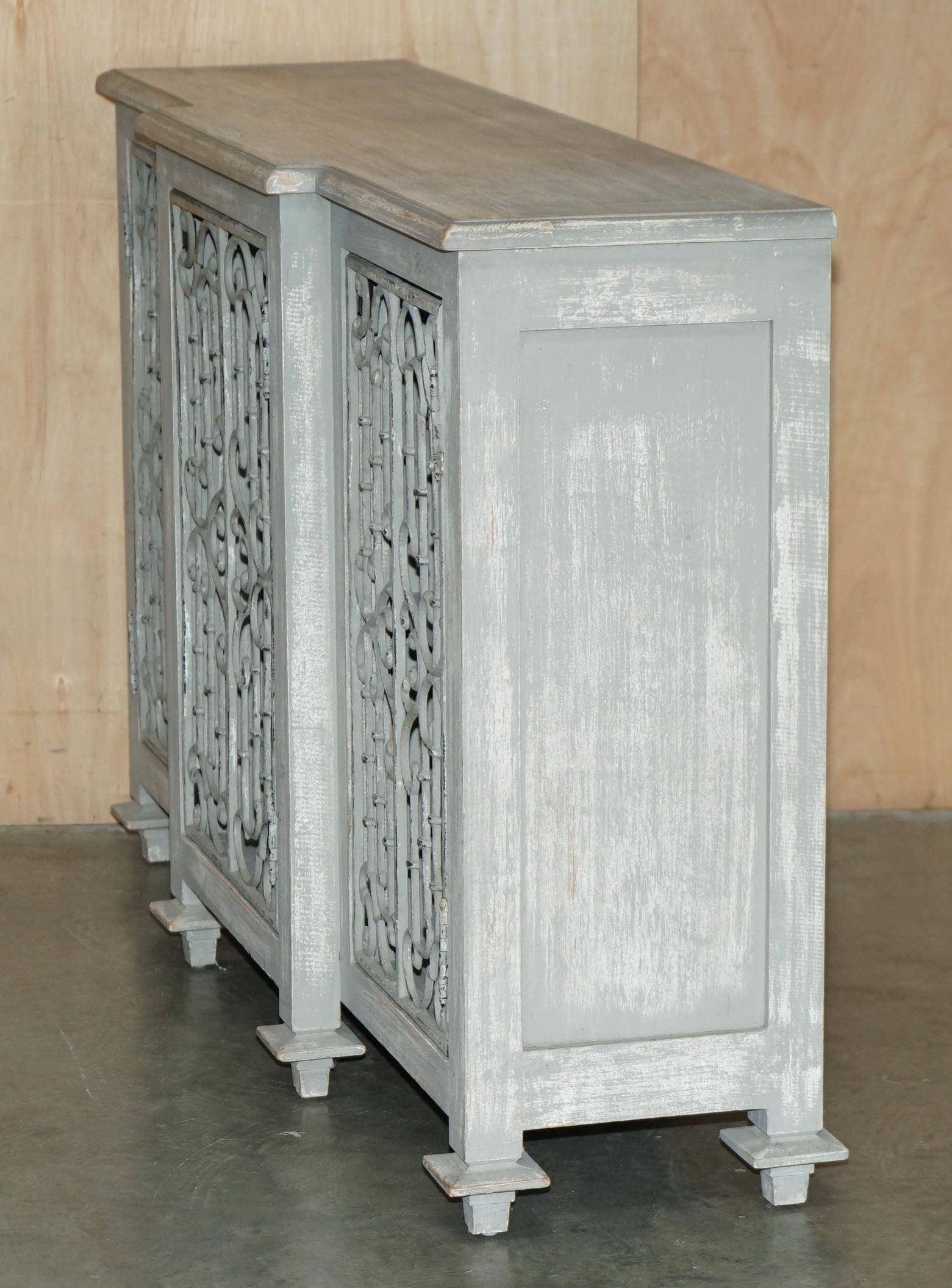Vintage sideboard with wrought iron doors