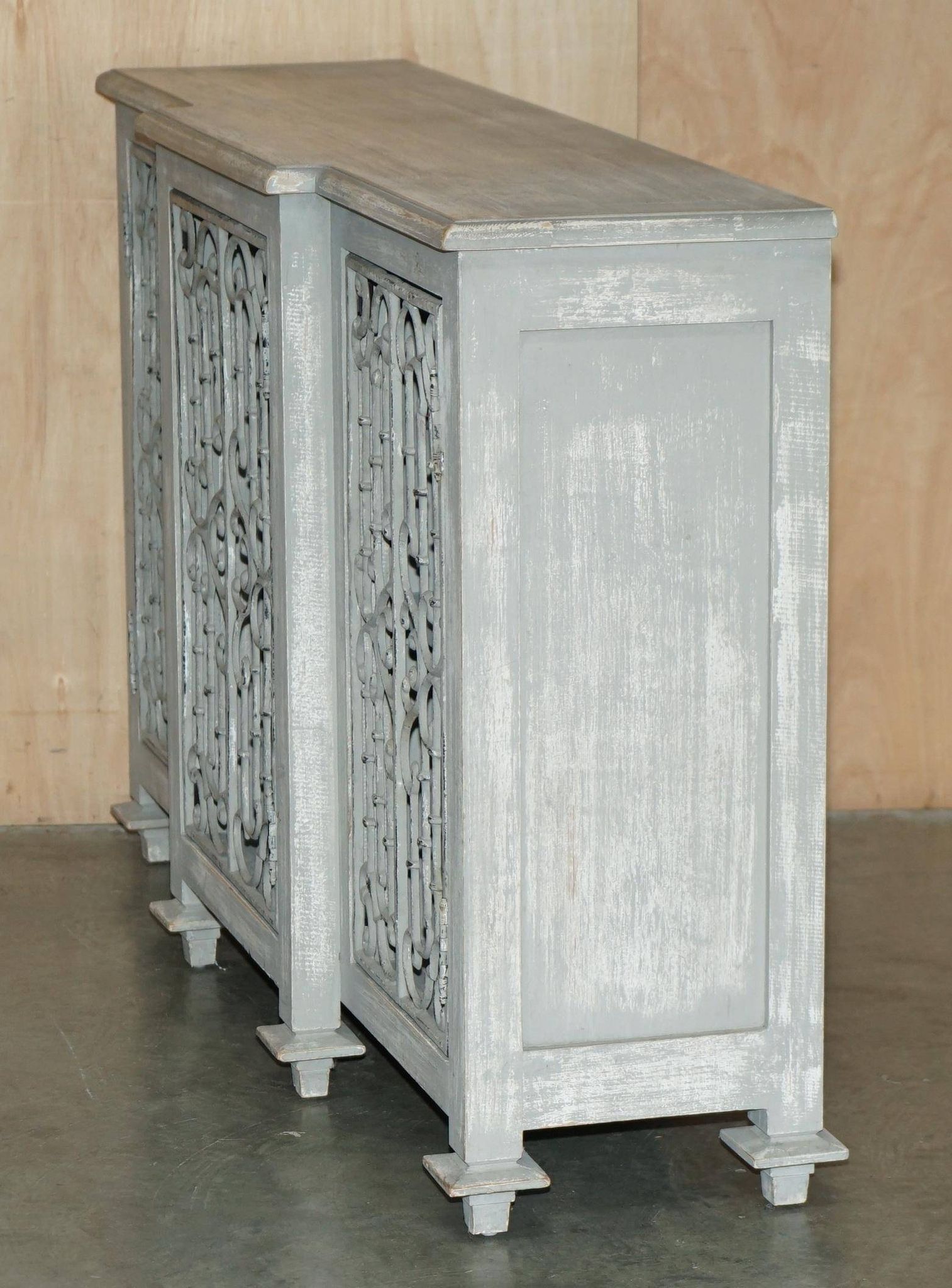Vintage sideboard with wrought iron doors