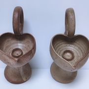 Pair of vintage “heart” sandstone candlesticks