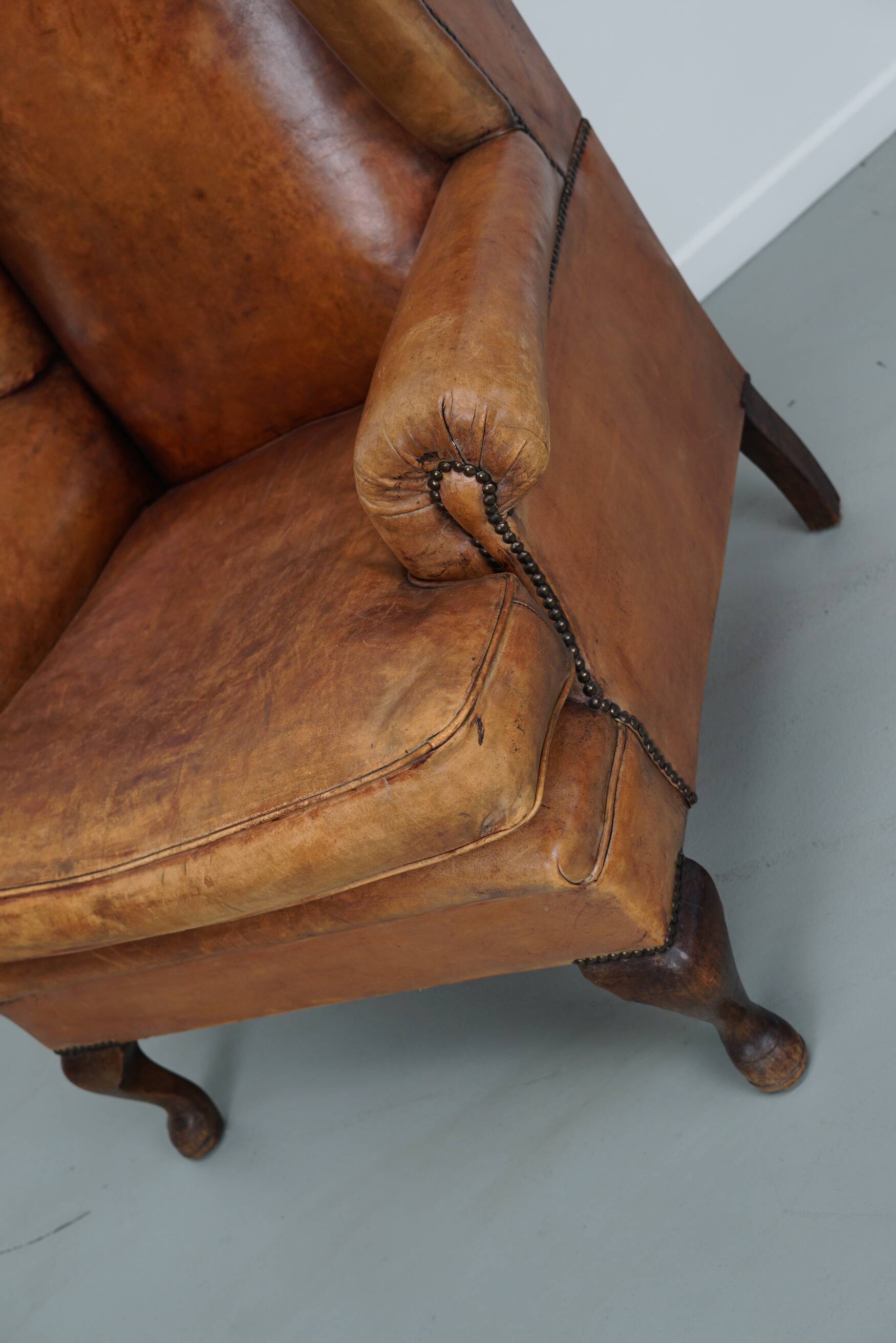 Vintage Dutch cognac coloured leather club chair, with footstool