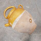 Old gargoulette pot in glazed terracotta