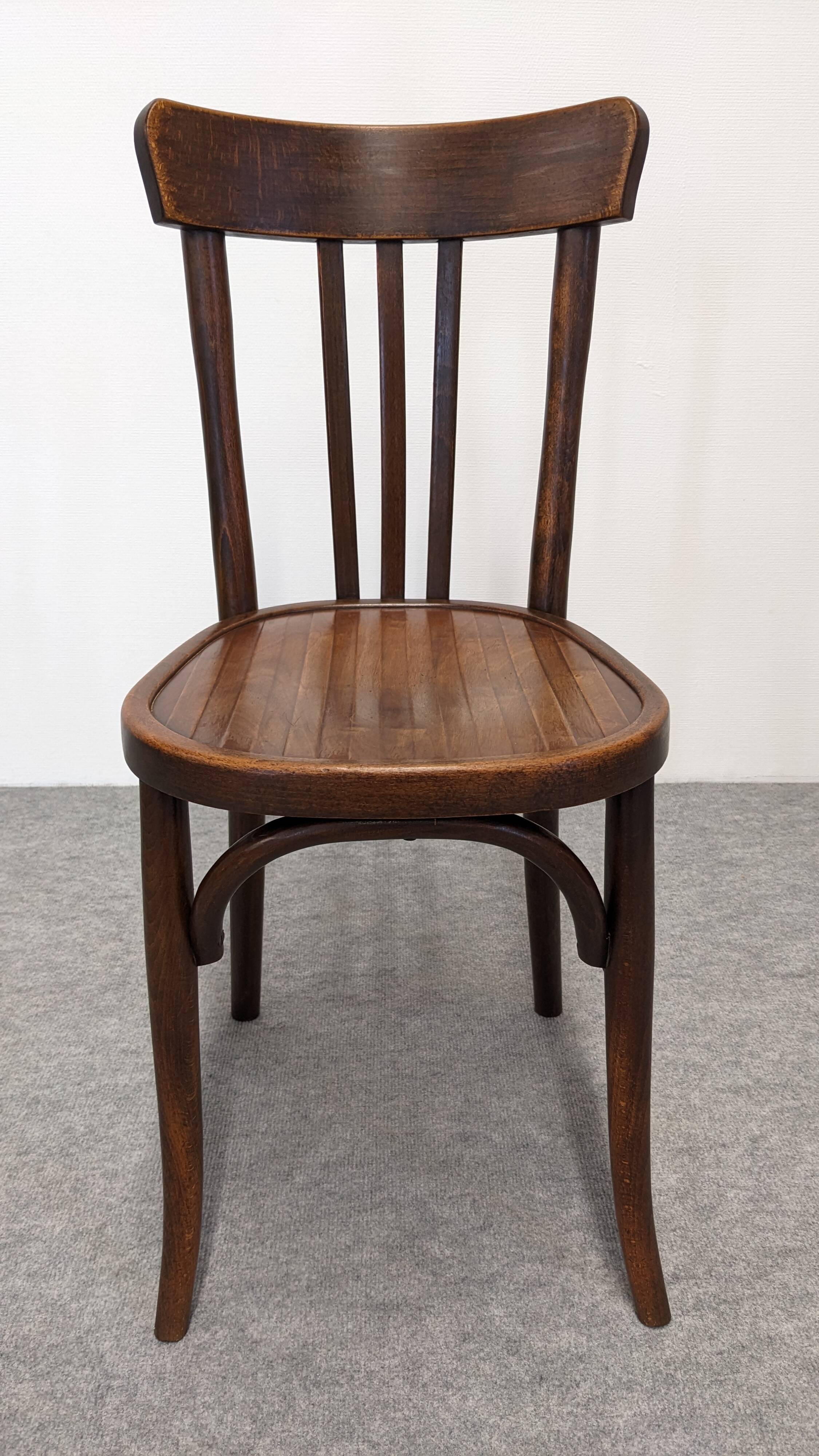 Set of 8 Baumann bistro chairs in bent beech, France circa 1930.