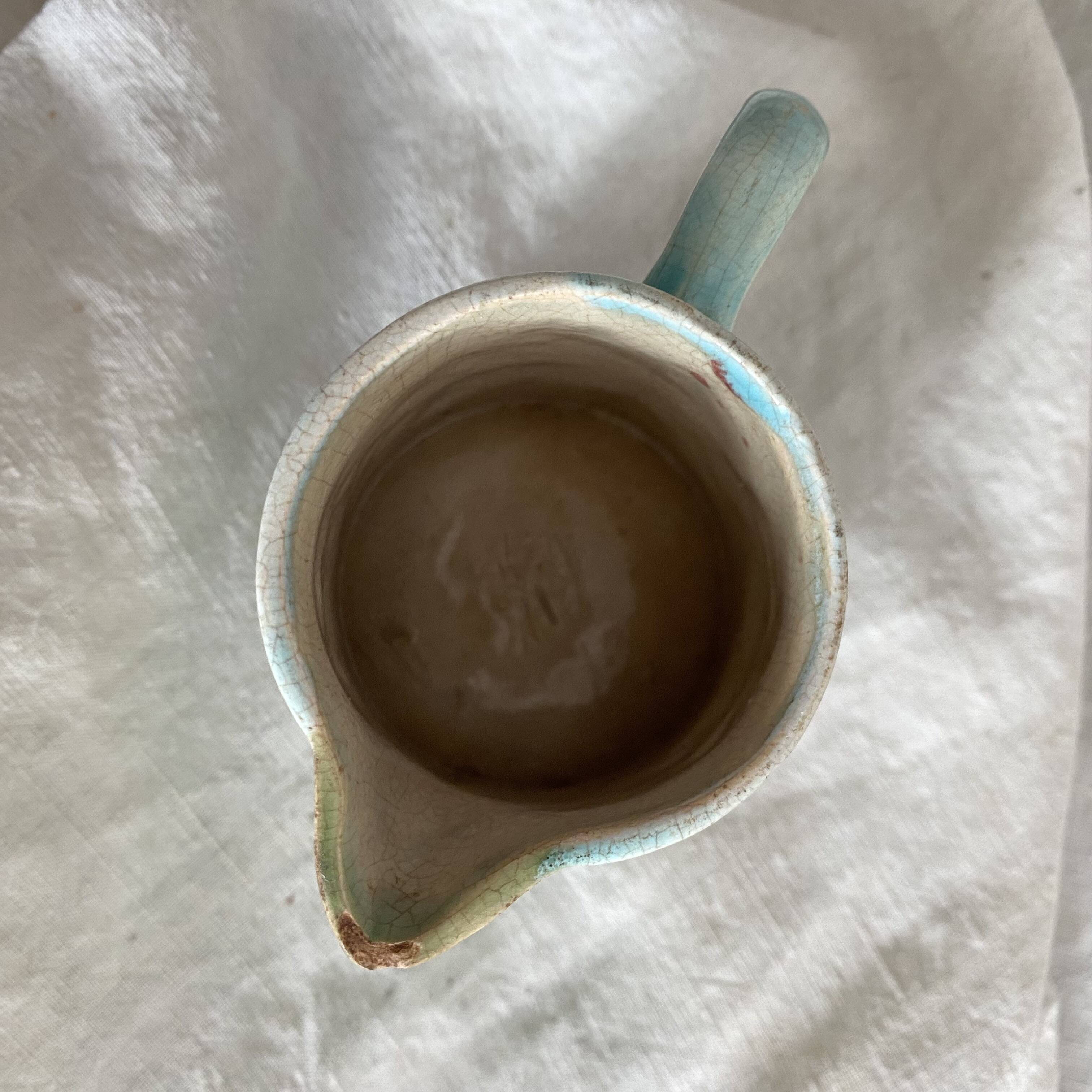 Small Art Nouveau slip milk pitcher
