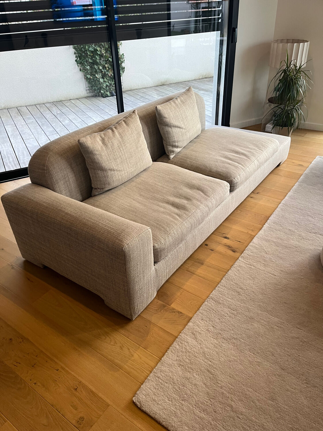 Three-seater fabric sofa