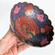 Vintage brass bowl with peacock motif, painted enamel, scalloped edge on a pedestal.