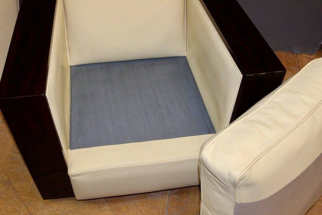 Pair of art deco armchairs in rosewood and beige leather