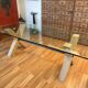 Rectangular dining table with glass top from Roche Bobois.
