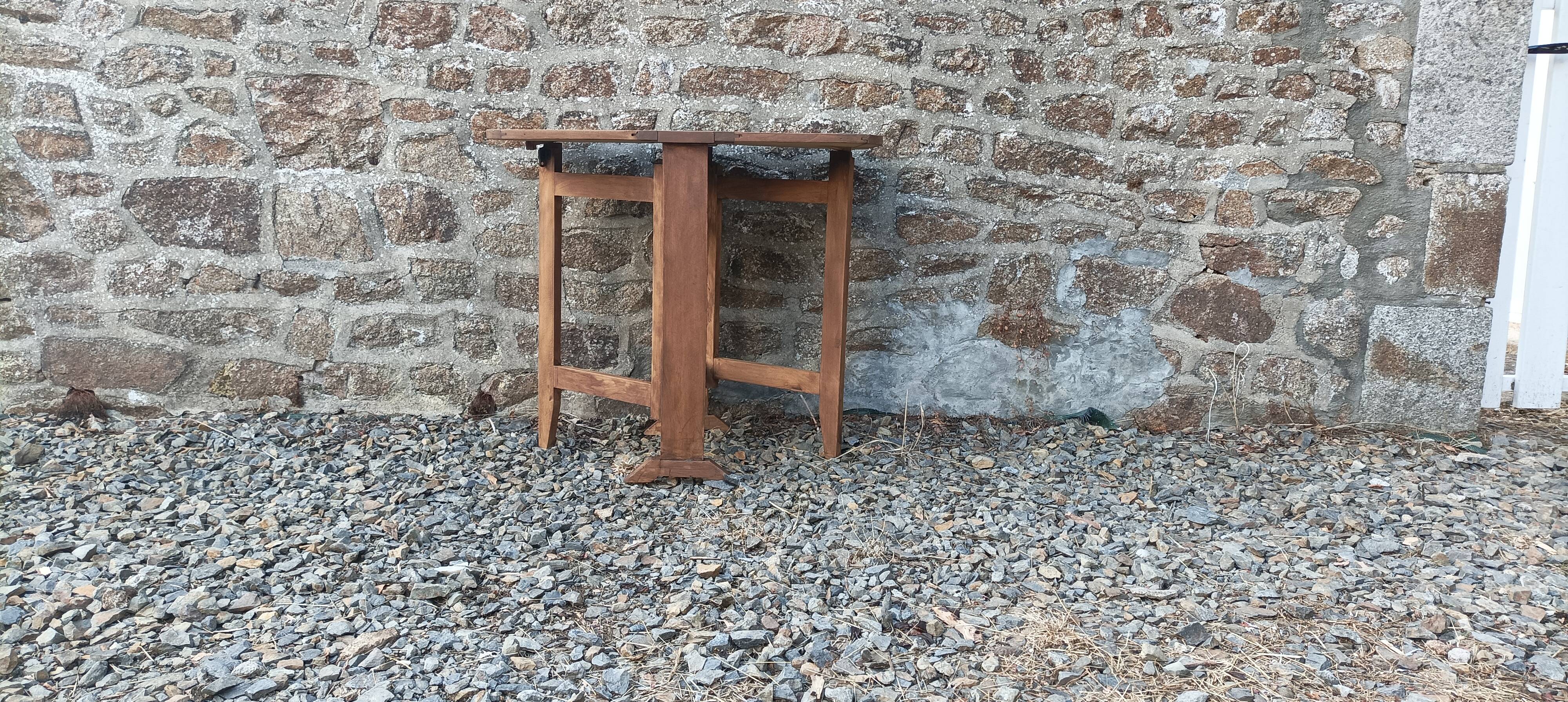 Old wooden table with double swings