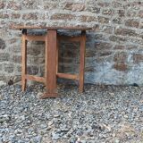 Old wooden table with double swings