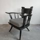 Pair of antique hand-carved armchairs in black lacquer from the 1920s.
