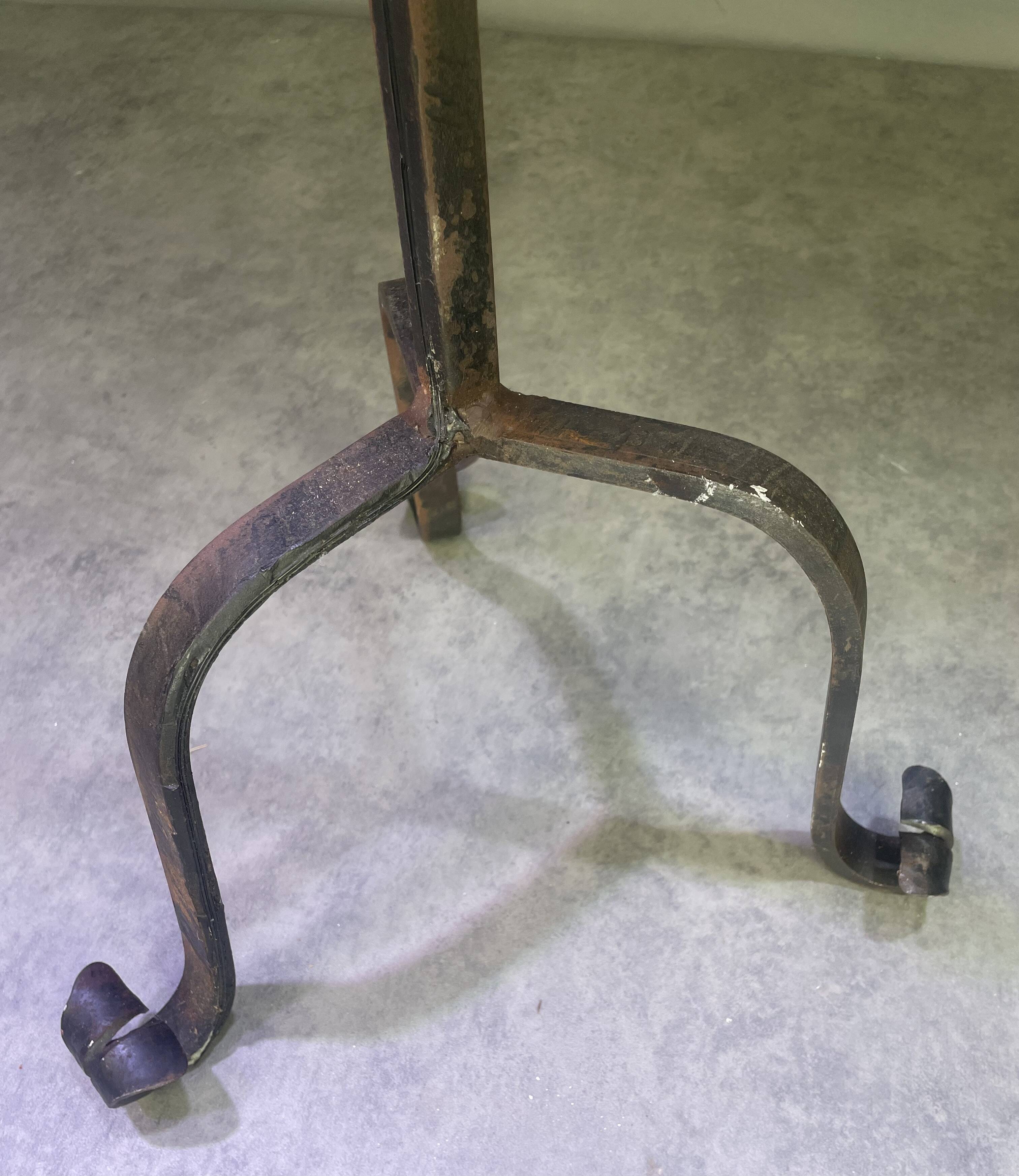 Pair of wrought iron candelabras