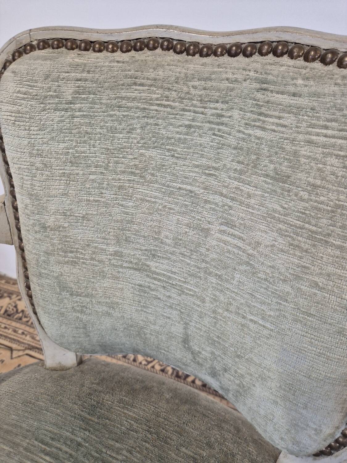 Louis XV style cabriolet armchair in patinated wood and velvet