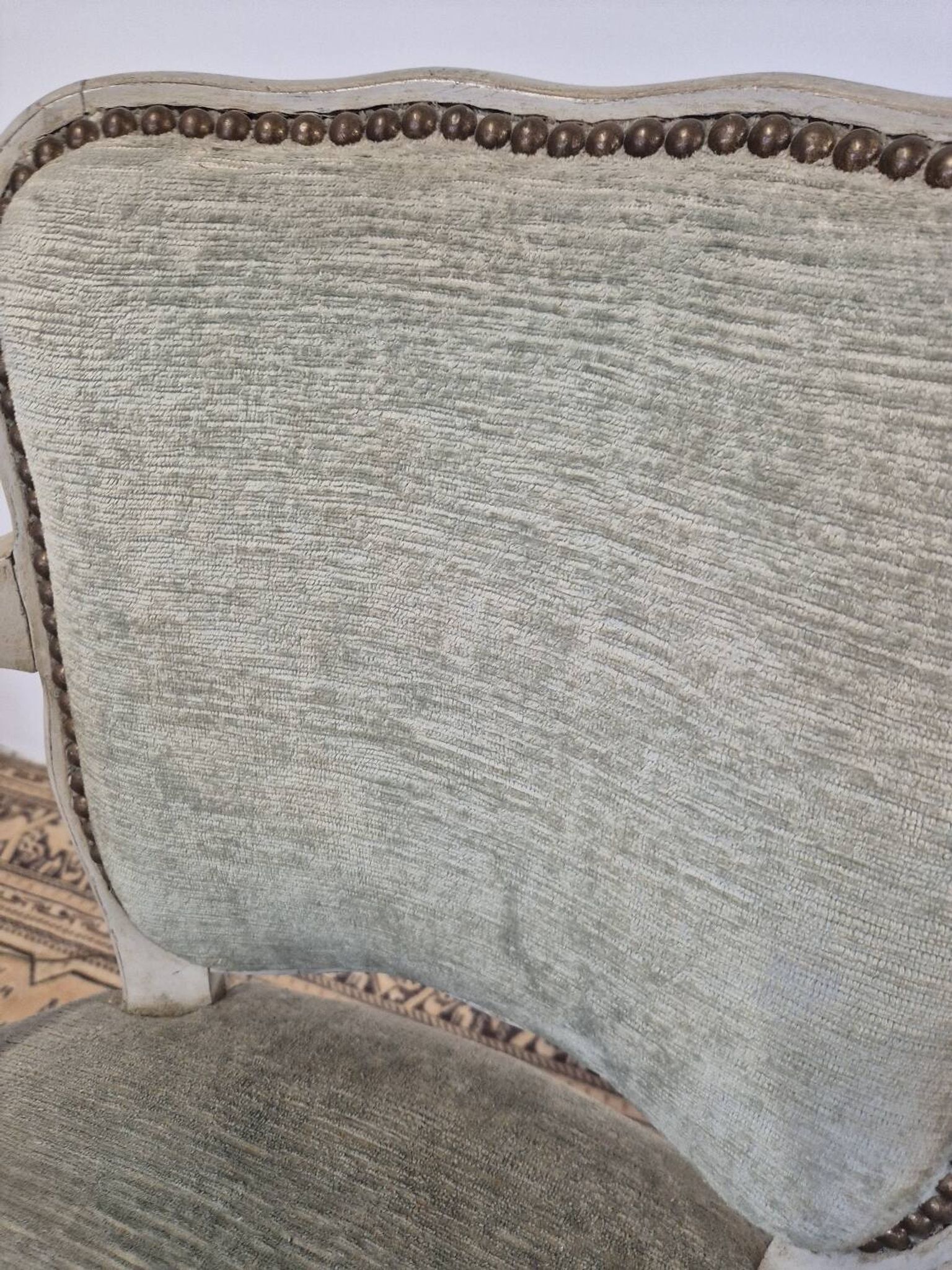 Louis XV style cabriolet armchair in patinated wood and velvet