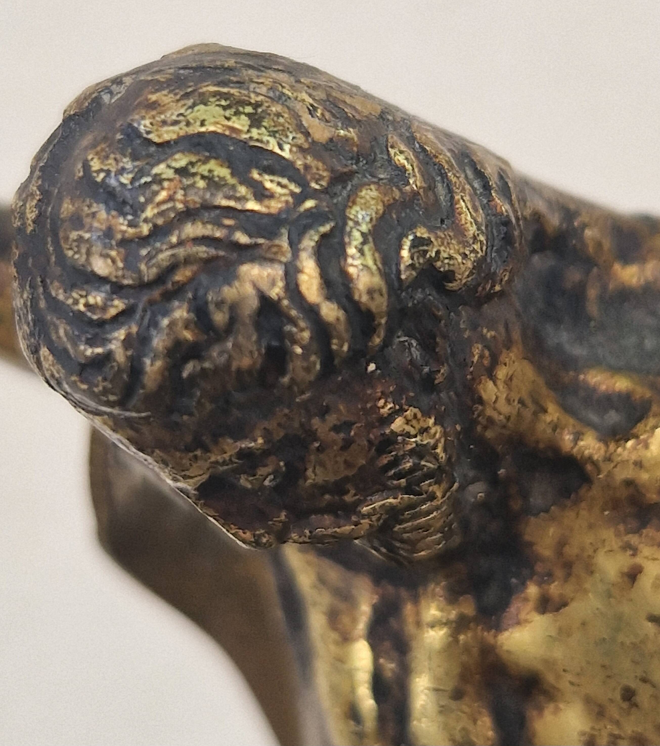 Ancient bronze Christ on a contemporary base