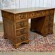 English flat desk with drawers from the 1970s in fir and leather top.
