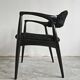 Pair of Mid Century Modern armchairs in astrakhan leather.