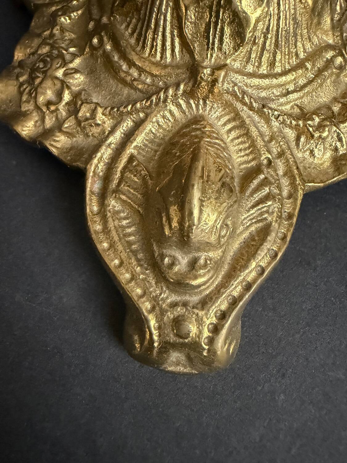 Antique crystal bowl on a bronze stand.