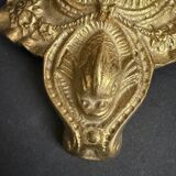 Antique crystal bowl on a bronze stand.