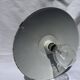 Antique wall lamp with an enamelled metal shade and porcelain.