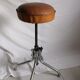 Vintage rotating stool seated in leather and chrome legs