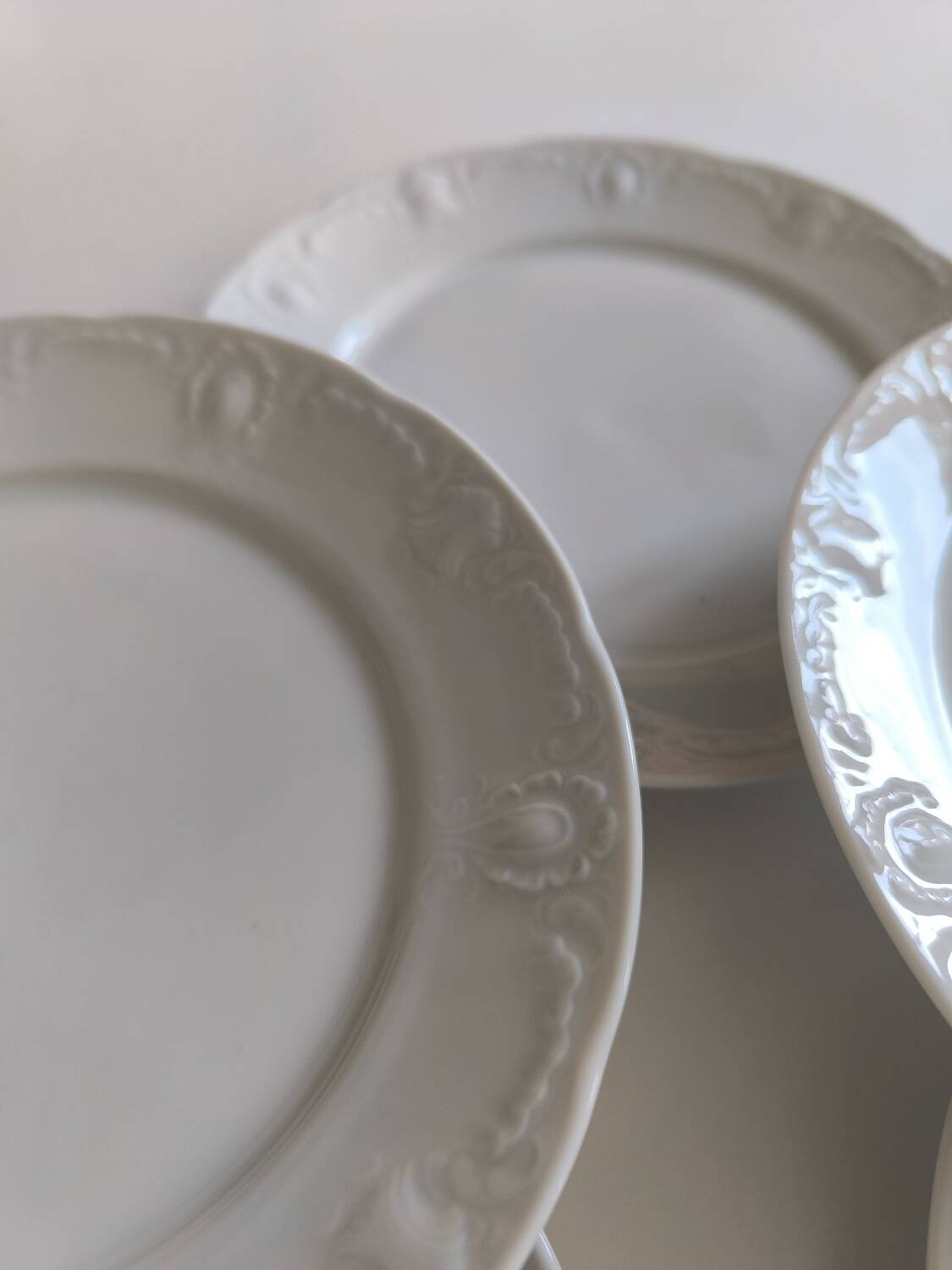Set of five porcelain dessert plates