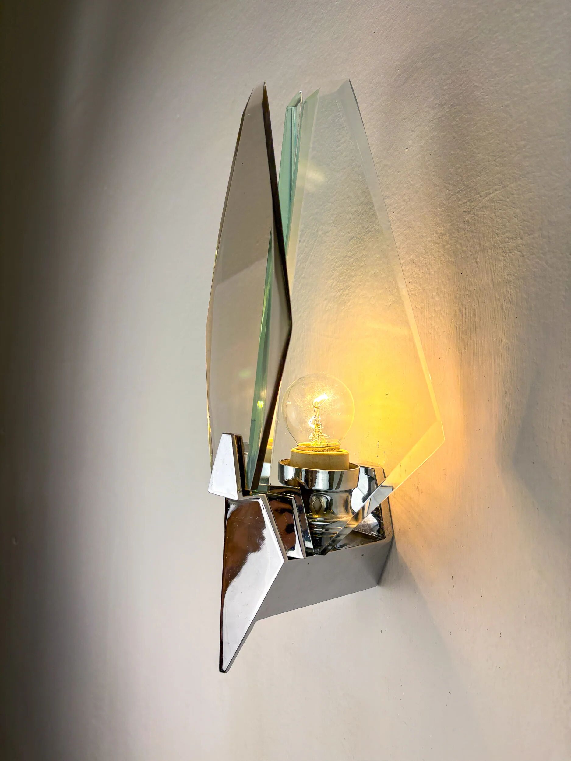 Pair of Veca sconces, Murano blue cut glass & black lucite, Italy, circa 1970s