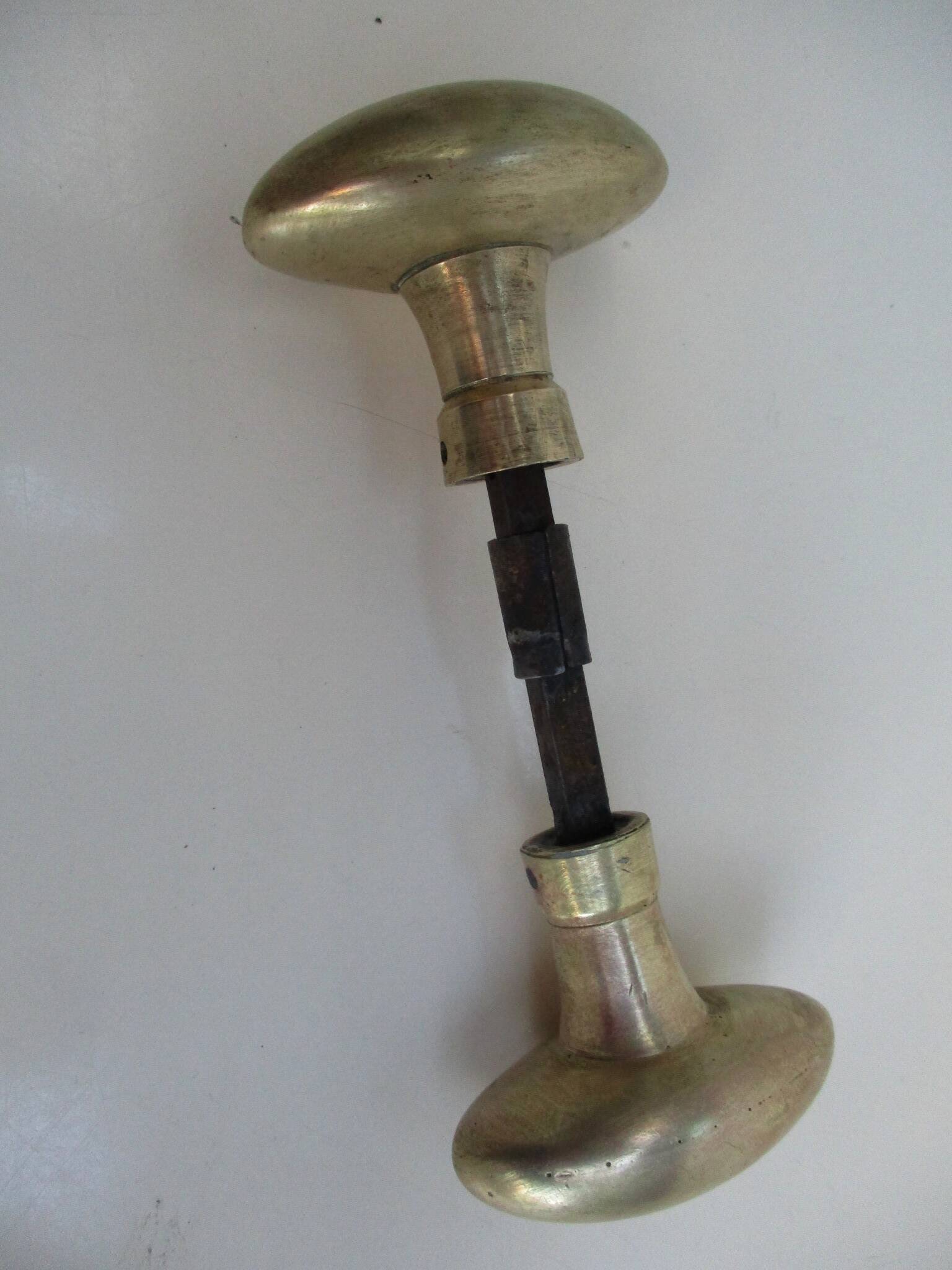 Antique oval brass door handles