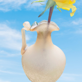 Old decorative carafe in li-colored glass