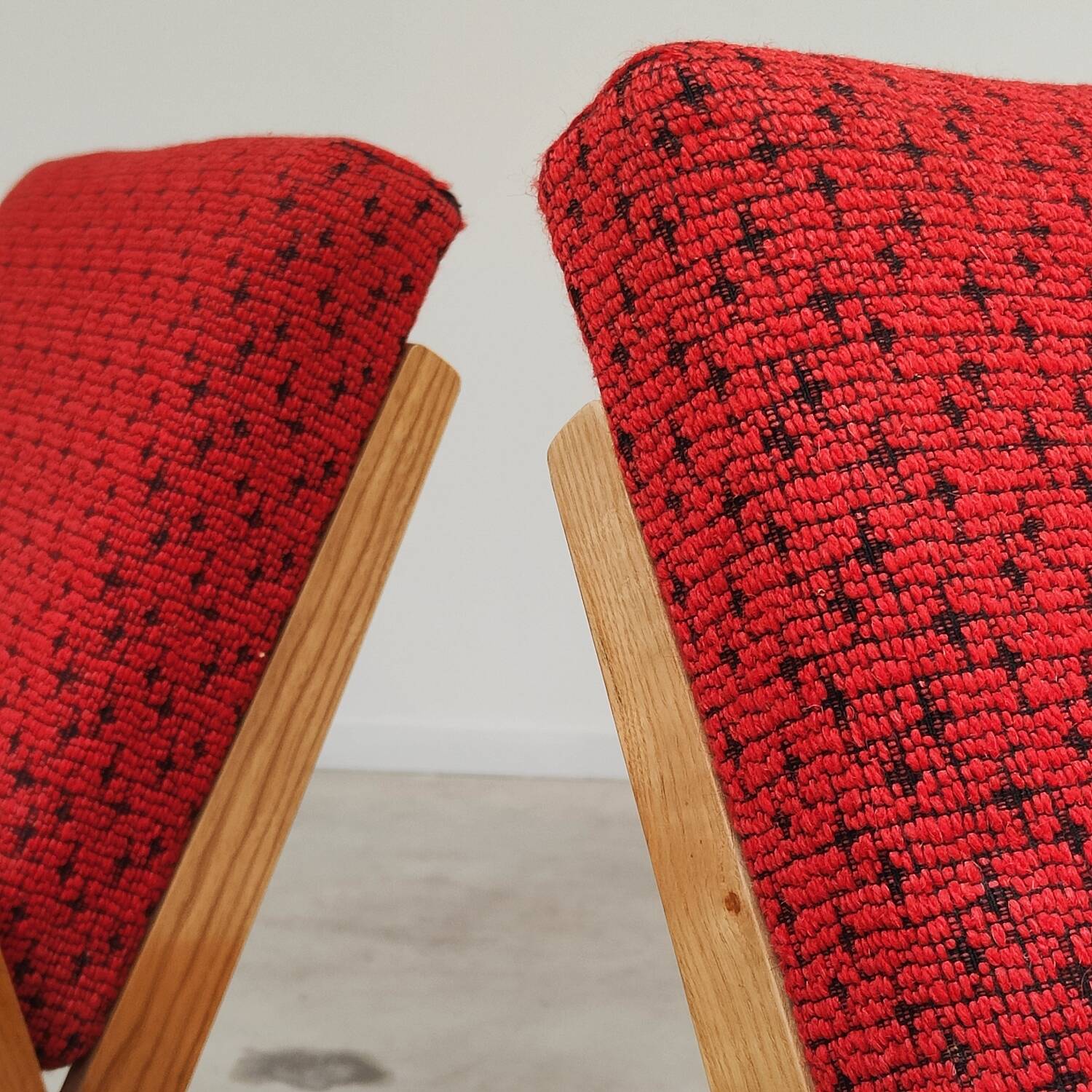 Pair of armchairs in mottled red and wood by Uluv, former Czechoslovakia 1960