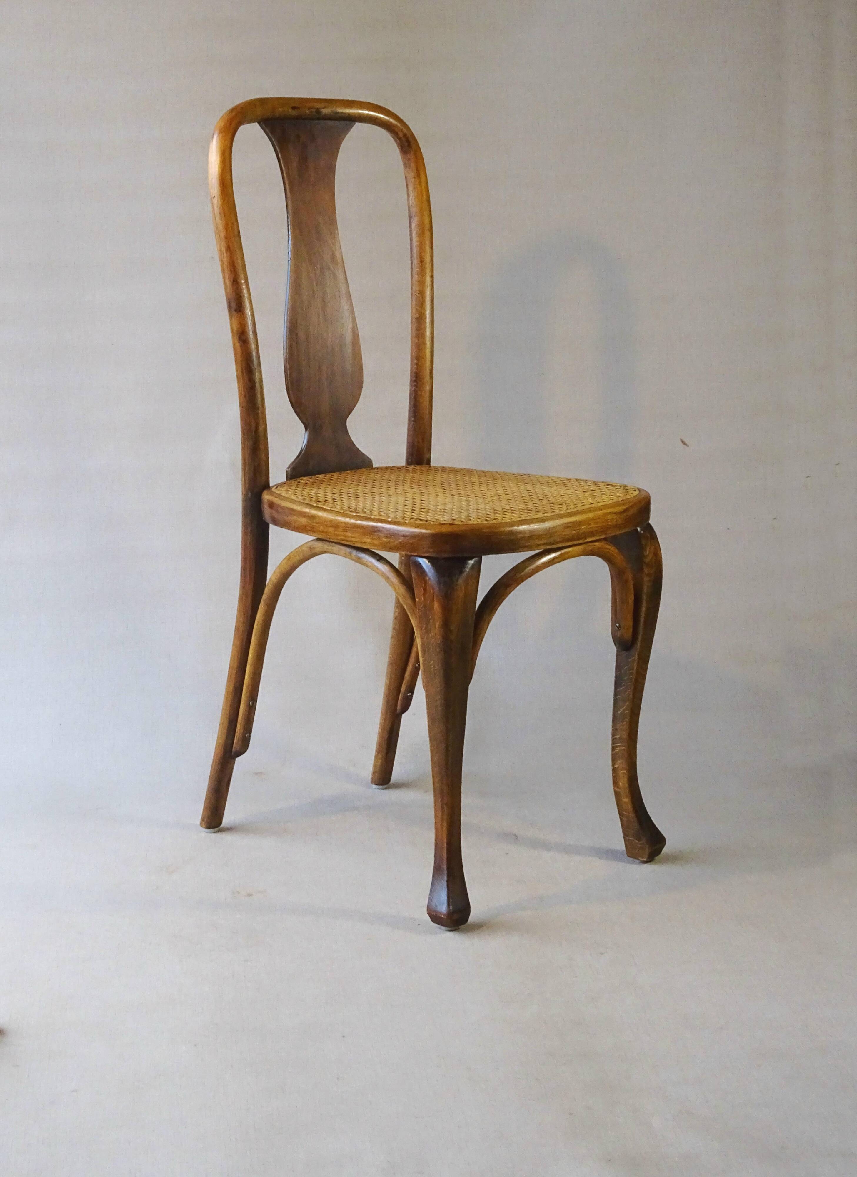 Two Kohn chairs, No. 529, circa 1910, bistro style, caned, bentwood