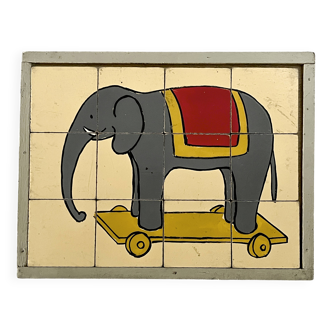 Wooden puzzle frame from the 1930s/40s depicting a circus elephant