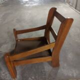 Armchairs in leather and vintage wood 70's