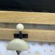 Wall-mounted coat rack with porcelain hooks