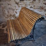 French garden bench in iron and wooden slats, mid-20th century.
