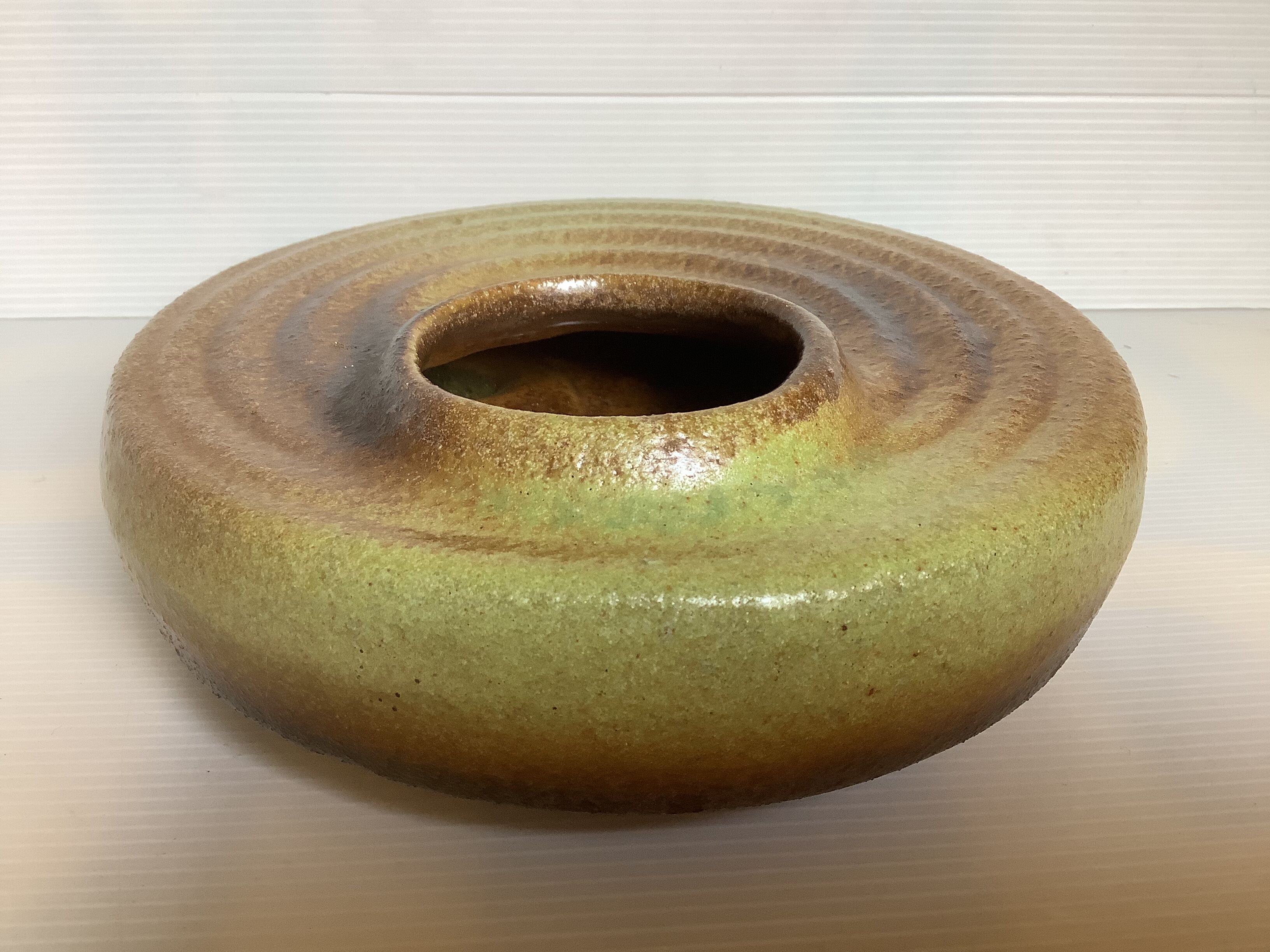 Tripod spiral vase in green and brown ceramic
